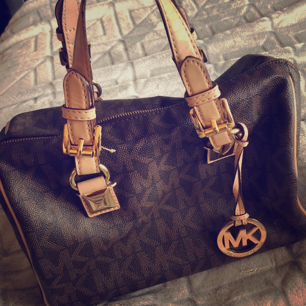 Well loved Michael Kors speedy
